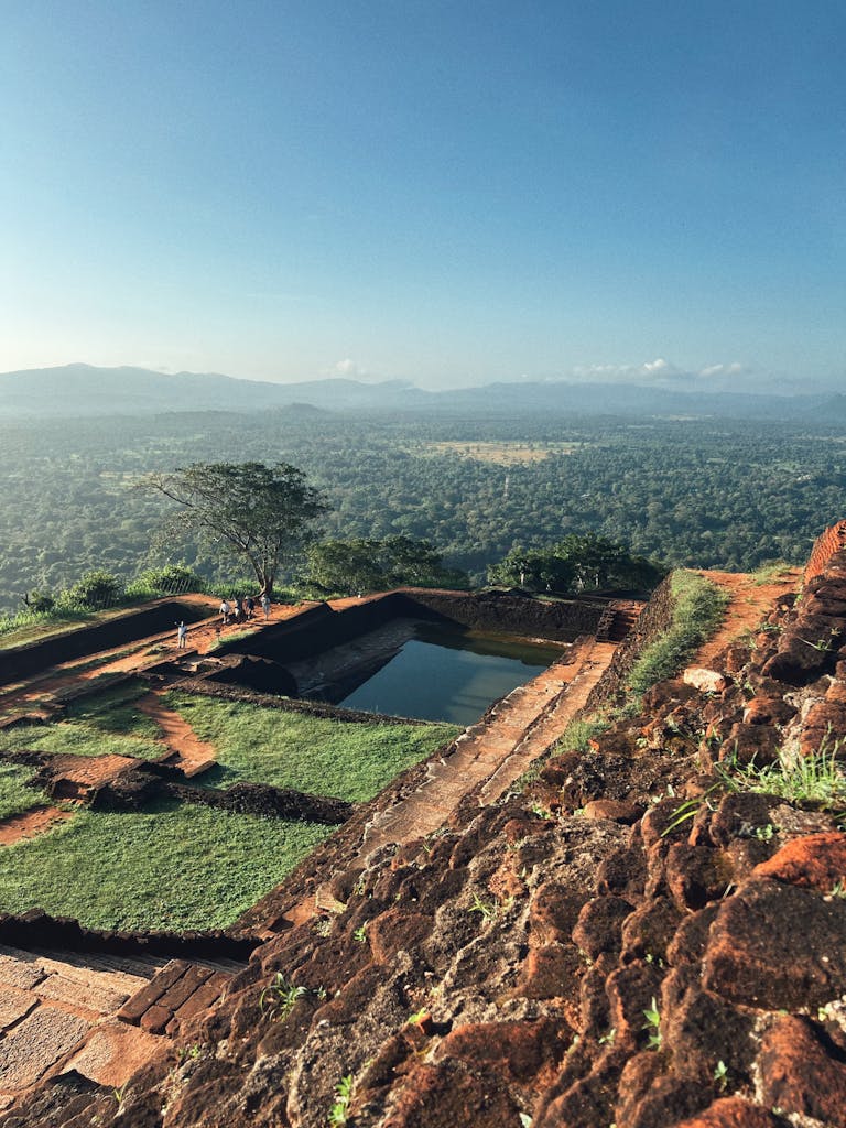 Explore the breathtaking panorama from Sigiriya Rock Fortress, Sri Lanka, a UNESCO World Heritage Site.